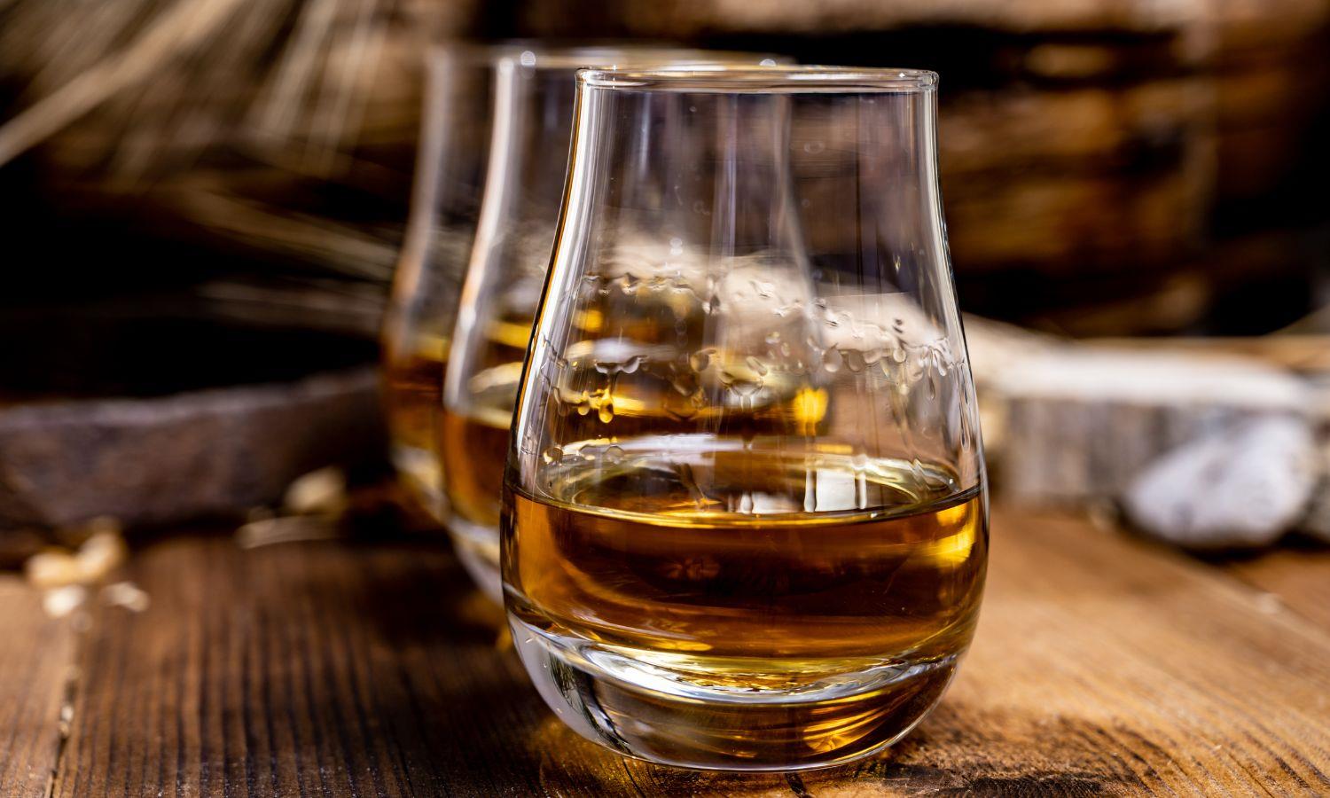 Three drams of whisky lined up for whisky tasting experience